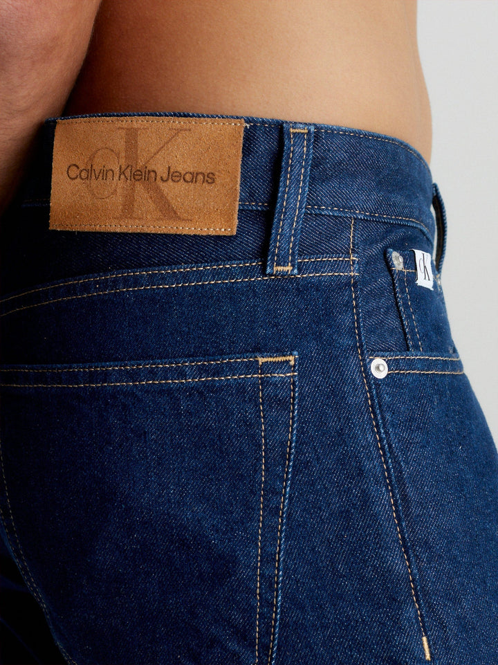 بنطال جينز كالفن كلاين جينز مستقيم متوسط ​​الطول أزرق